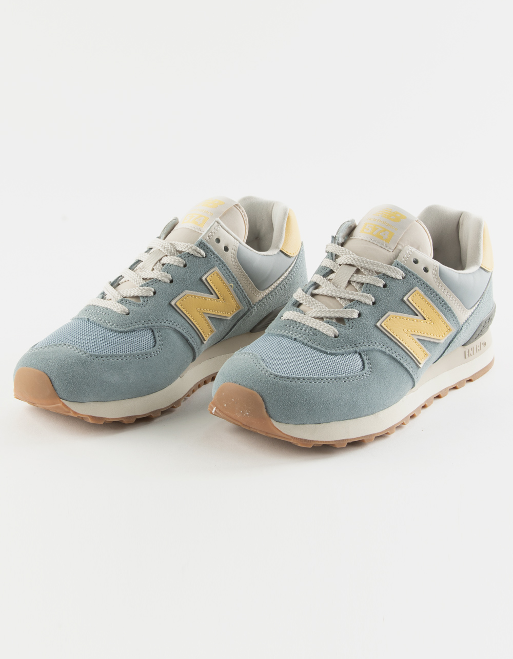 Pacer Leia intimidad NEW BALANCE 574 Womens Shoes - BABY BLUE | Tillys